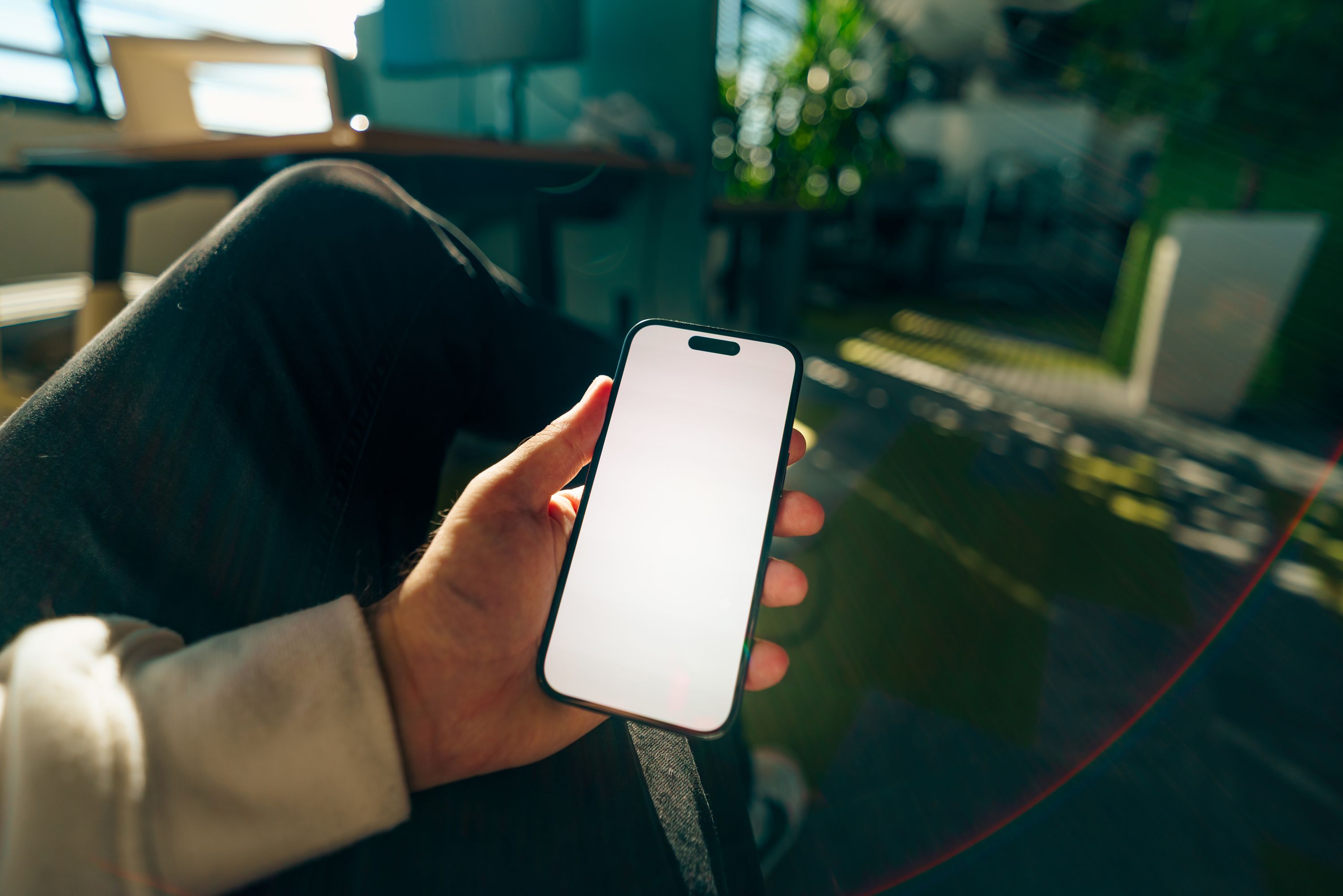 Holding a phone while browsing a photo gallery